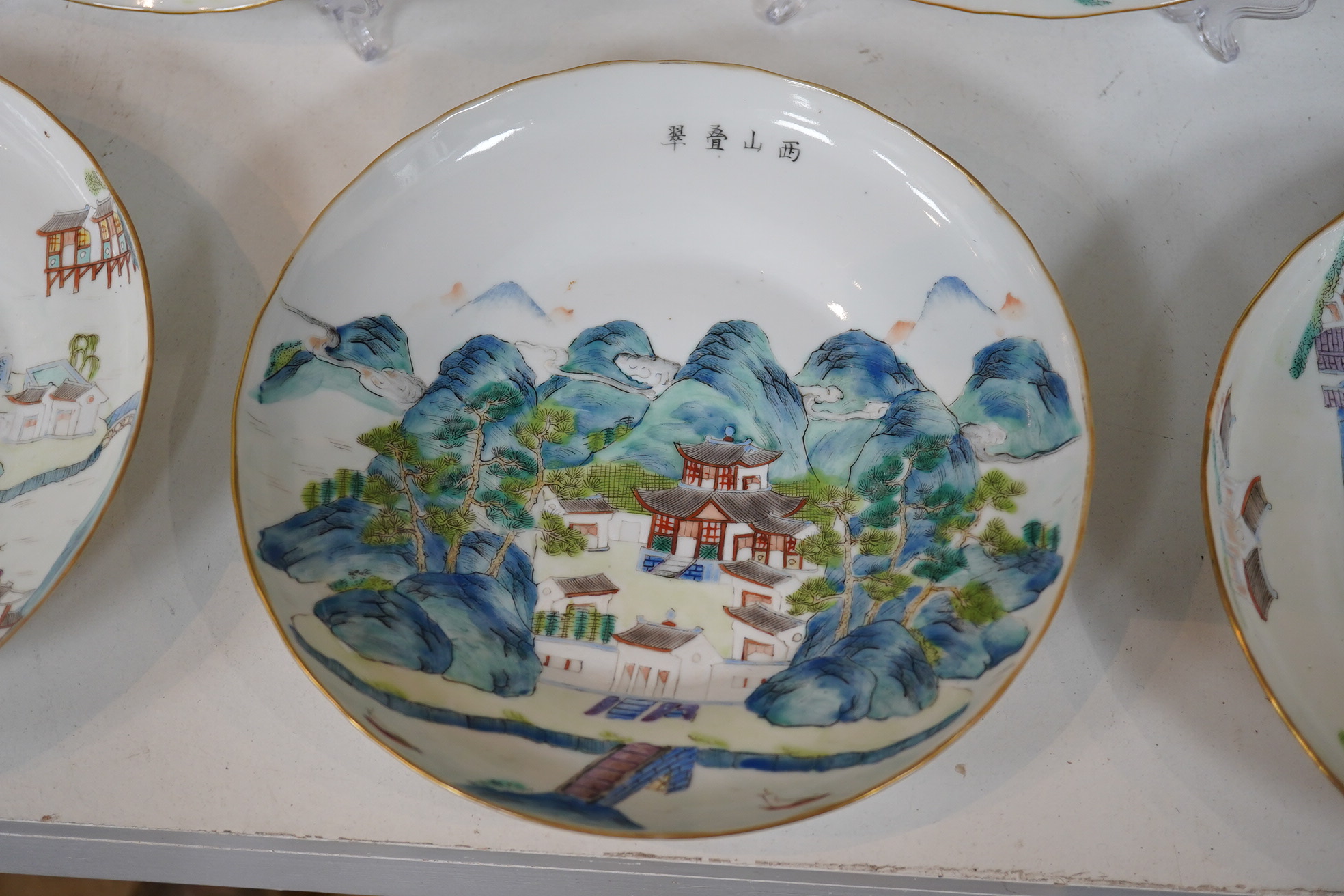 A set of five Chinese enamelled porcelain ‘pavilion’ dishes, Daoguang mark and period (1821-50)